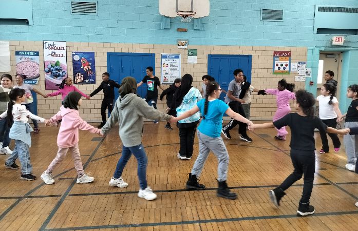  students holding hands